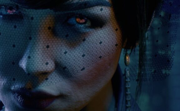 Vampire The Masquerade Bloodlines 2 female vampire with glowing eyes wearing veil